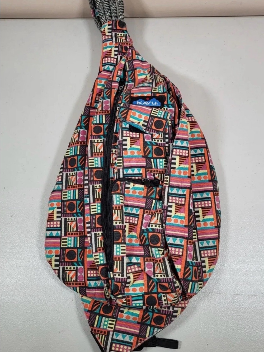 Kavu Multicolor Geometric Print Crossbody Sling Bag - Pink, Teal, Orange, Black